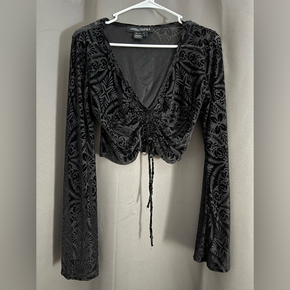 WARRIOR WITHIN DESIGNS
Midnight Burnout Velvet Bell Sleeve Cinch Top
